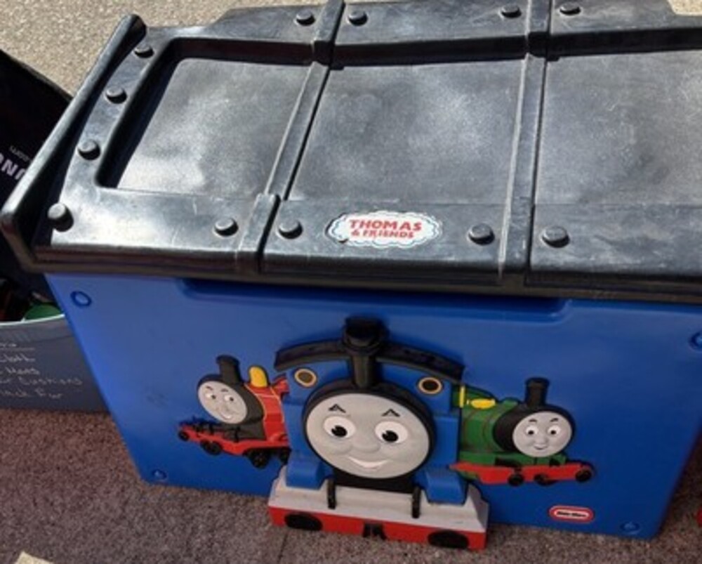 Blue toy box featuring Thomas the Tank Engine design.